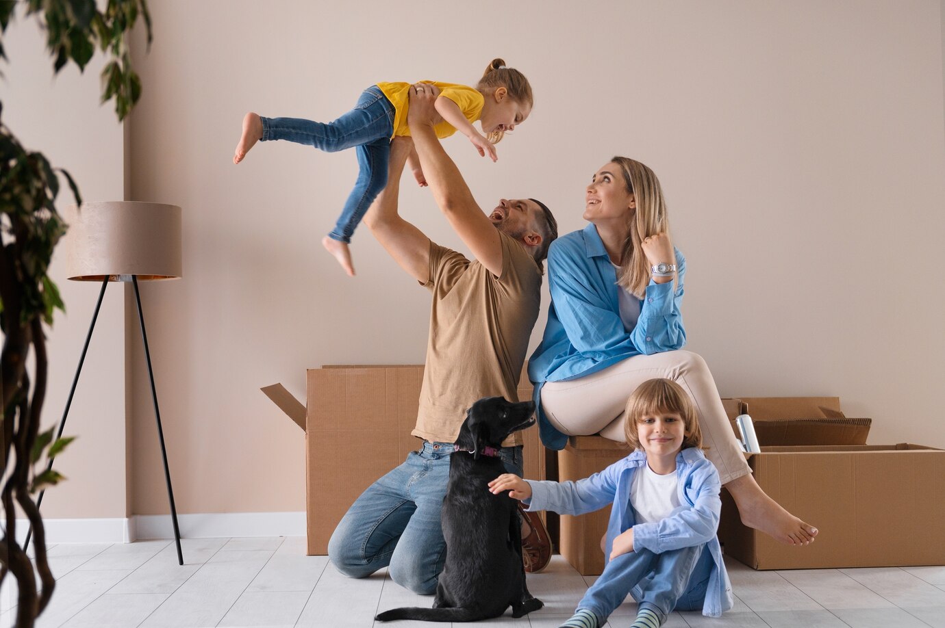 happy-family-with-dog-moving-in-new-home_23-2149749158.jpg